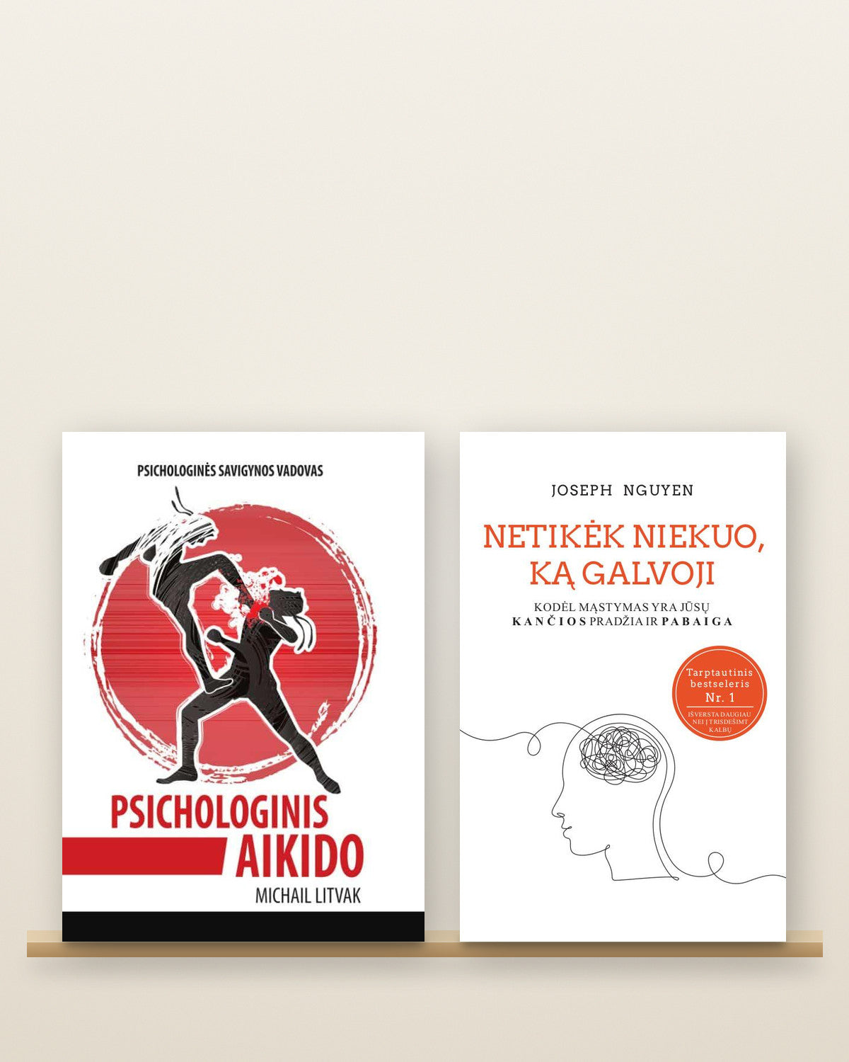 Knygos „Psichologinis aikido“ (Michailas Litvakas) ir „Netikėk niekuo, ką galvoji“ (Joseph Nguyen) lentynoje